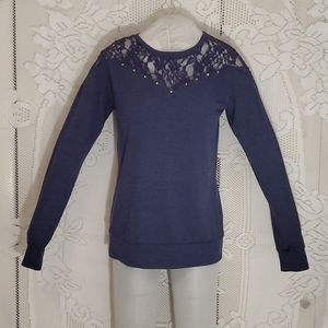 Poof long sleeve lace accent top with studded trim